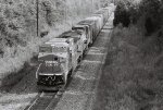 CR 6123 leads OIPI west at the Higginsville Bridge